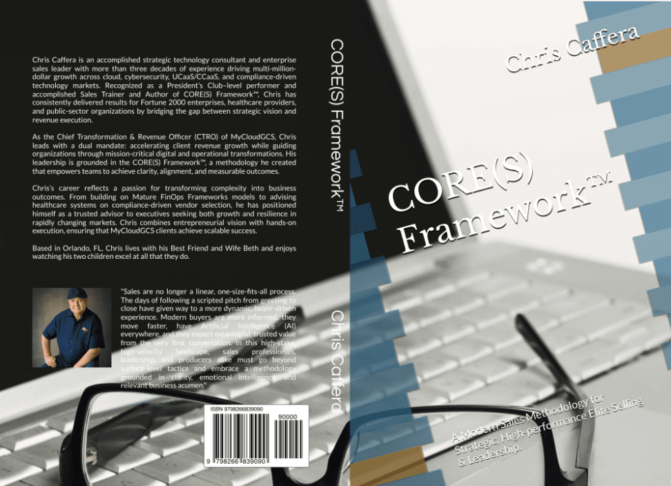 Close-up of an open book with reading glasses resting on it.